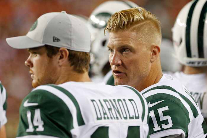 Aug 16, 2018; Landover, MD, USA; New York Jets quarterback Josh McCown (15) talks to Jets quarterback Sam Darnold (14) on the bench against the Washington Redskins in the third quarter at FedEx Field. The Redskins won 15-13.